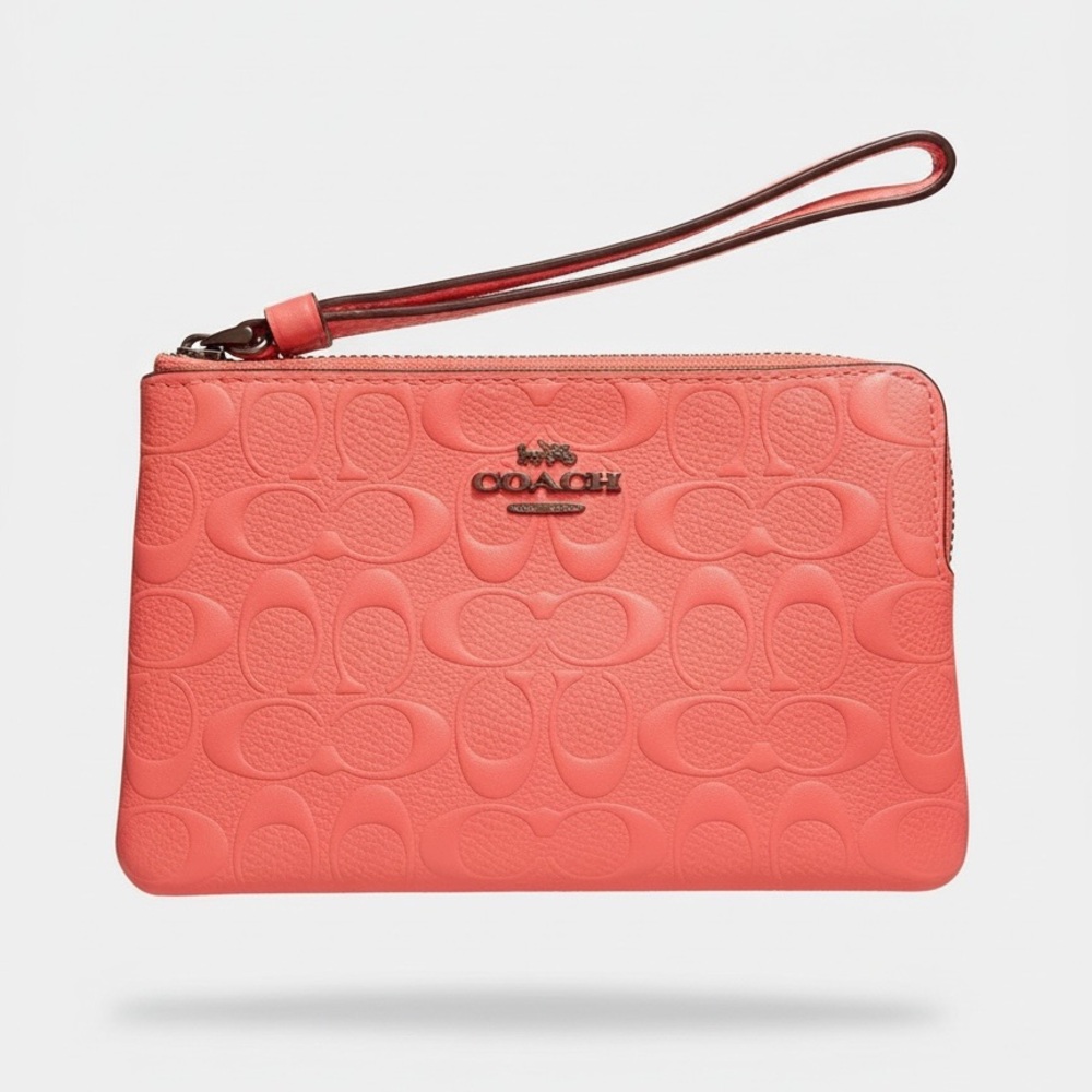Coach Pink Embossed Wristlet